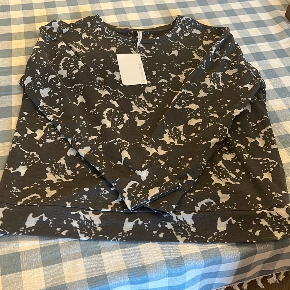 NWT Women’s Fabletics sweatshirt.